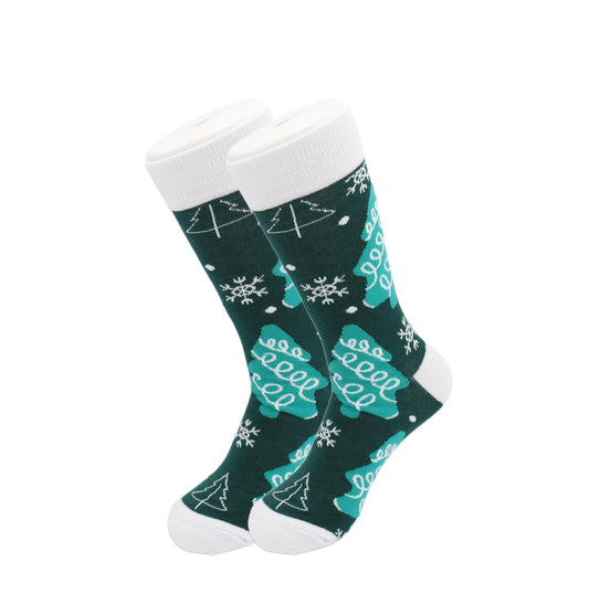 The Christmas Tree Socks: green crew socks with Christmas trees and snowflakes