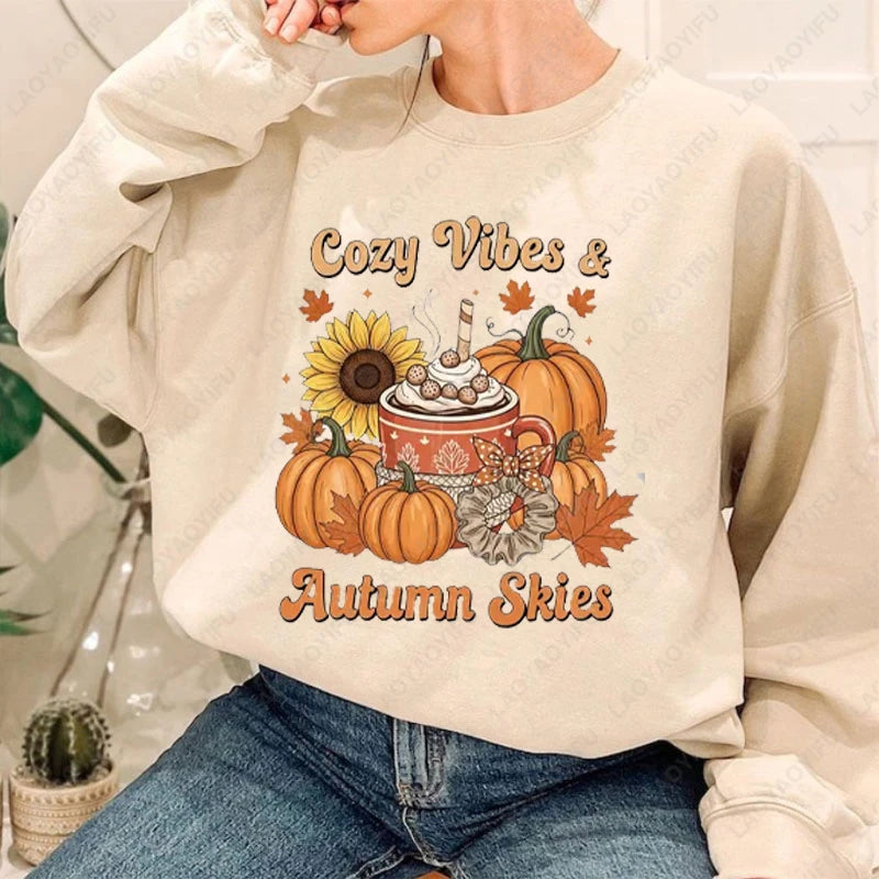Woman wearing the Cozy Vibes & Autumn Skies cream crewneck