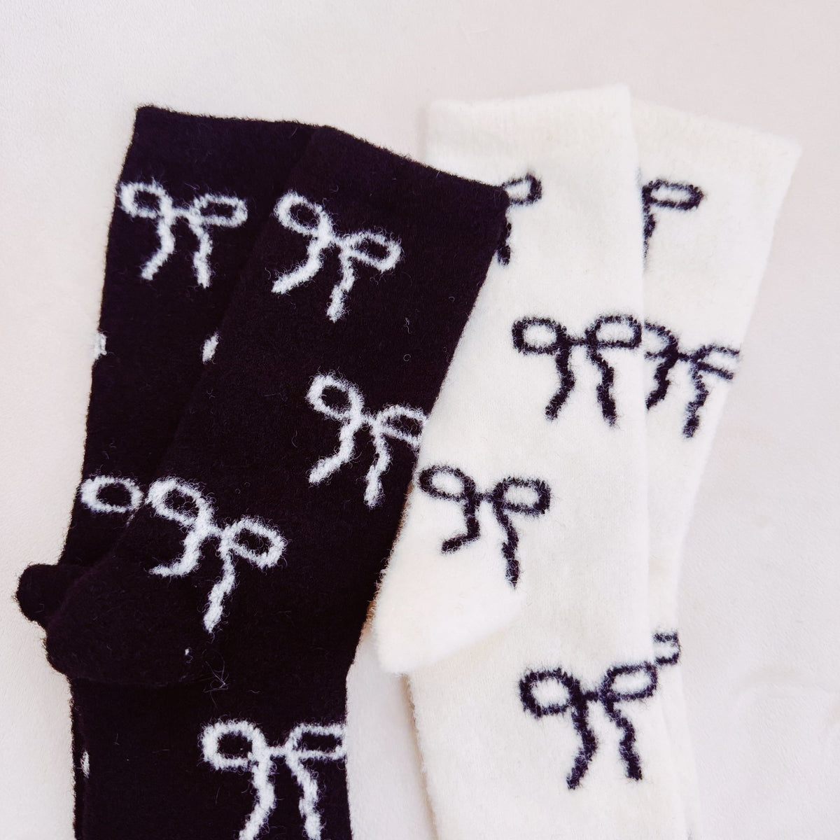 The Bow Fuzzy Socks Duo