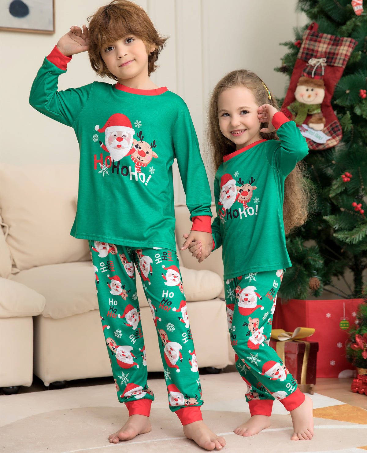 Family wearing the Green Santa matching pajamas